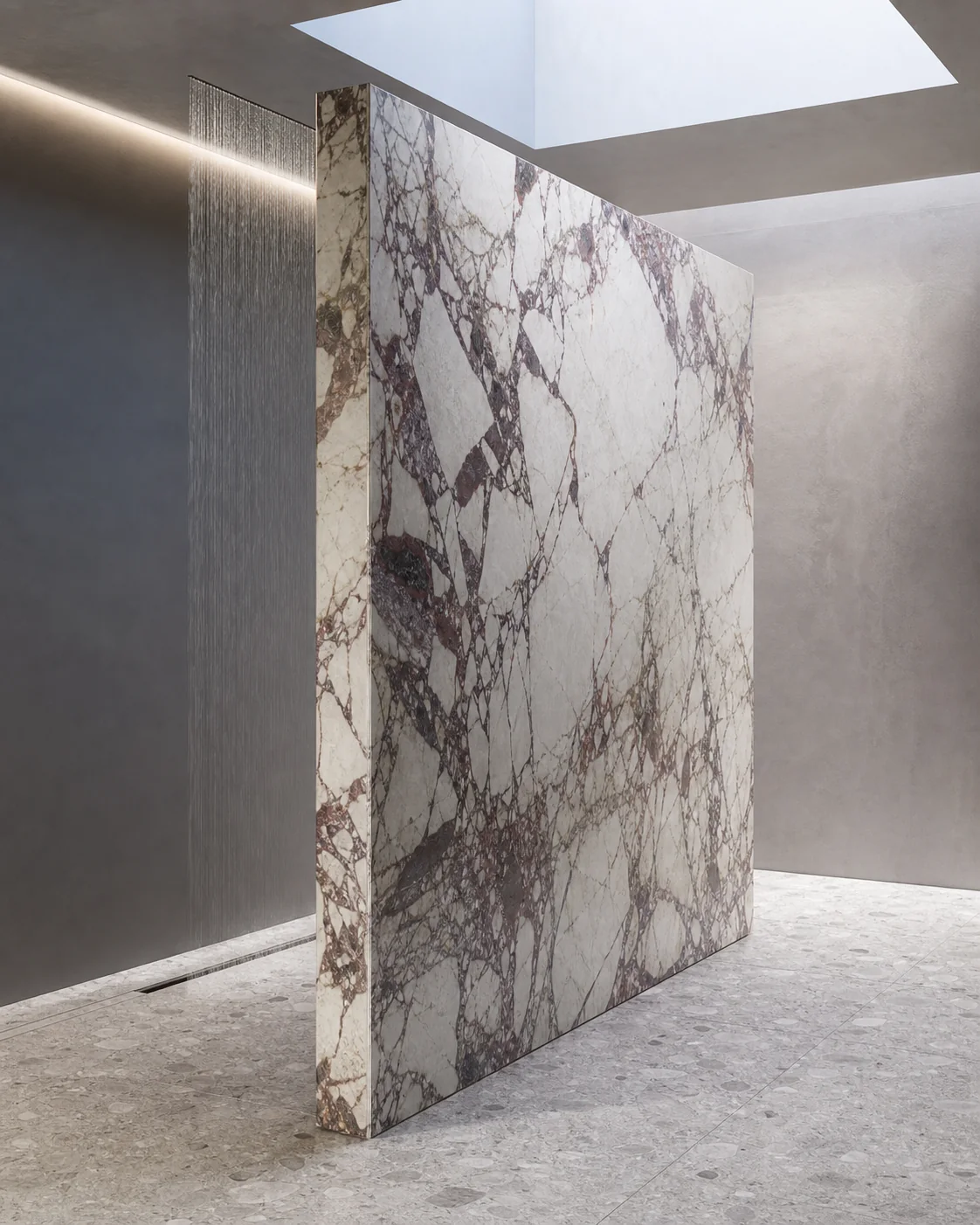 Freestanding Breccia Capraia porcelain shower divider showing a precisely finished slab edge