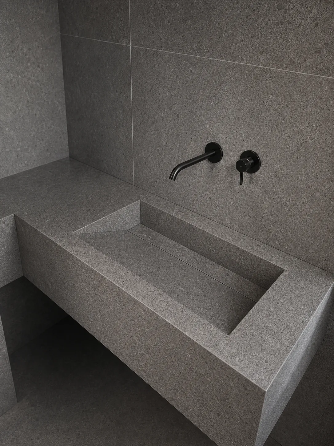 Large-format porcelain wet room surface with precise wall cuts