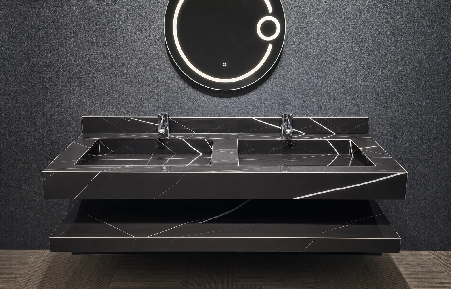 Black porcelain double sink fabrication with mitred trough basins and wall-mounted taps