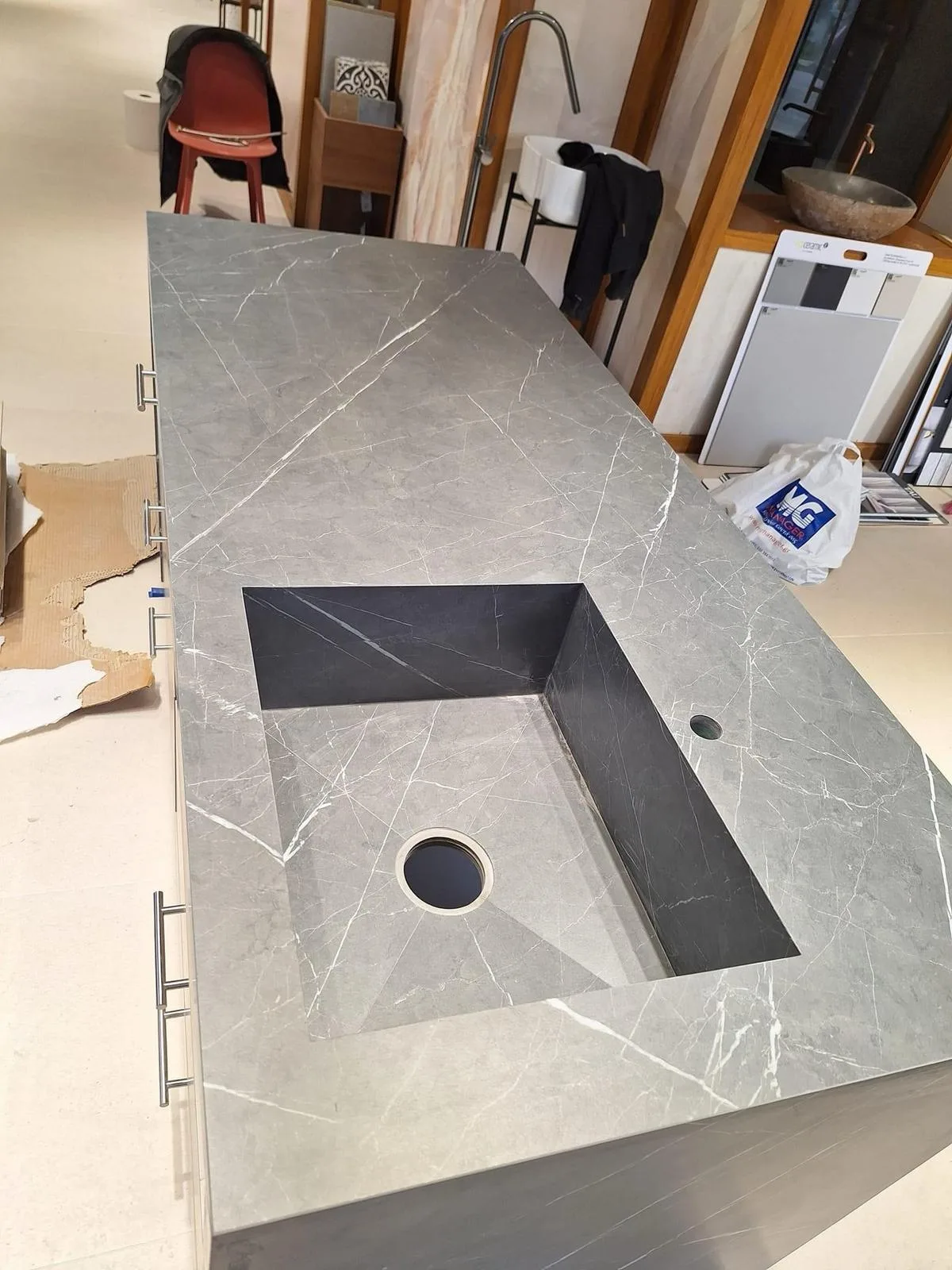 Porcelain slab basin cut-out being fabricated at Artiling Studio